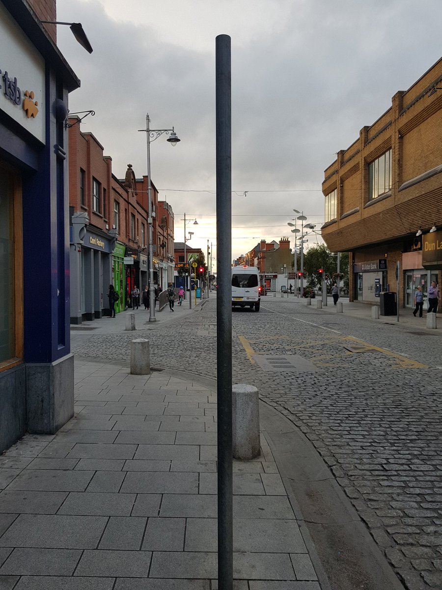 DLR_unnecessary's tweet photo. An inexplicably pointless pole on Upper George's Street, #DúnLaoghaire's main street. Can @dlrcc rationalise this? And could the "No right turn" sign not have been put on the existing lamp post? https://t.co/5Kjqb3LNl1