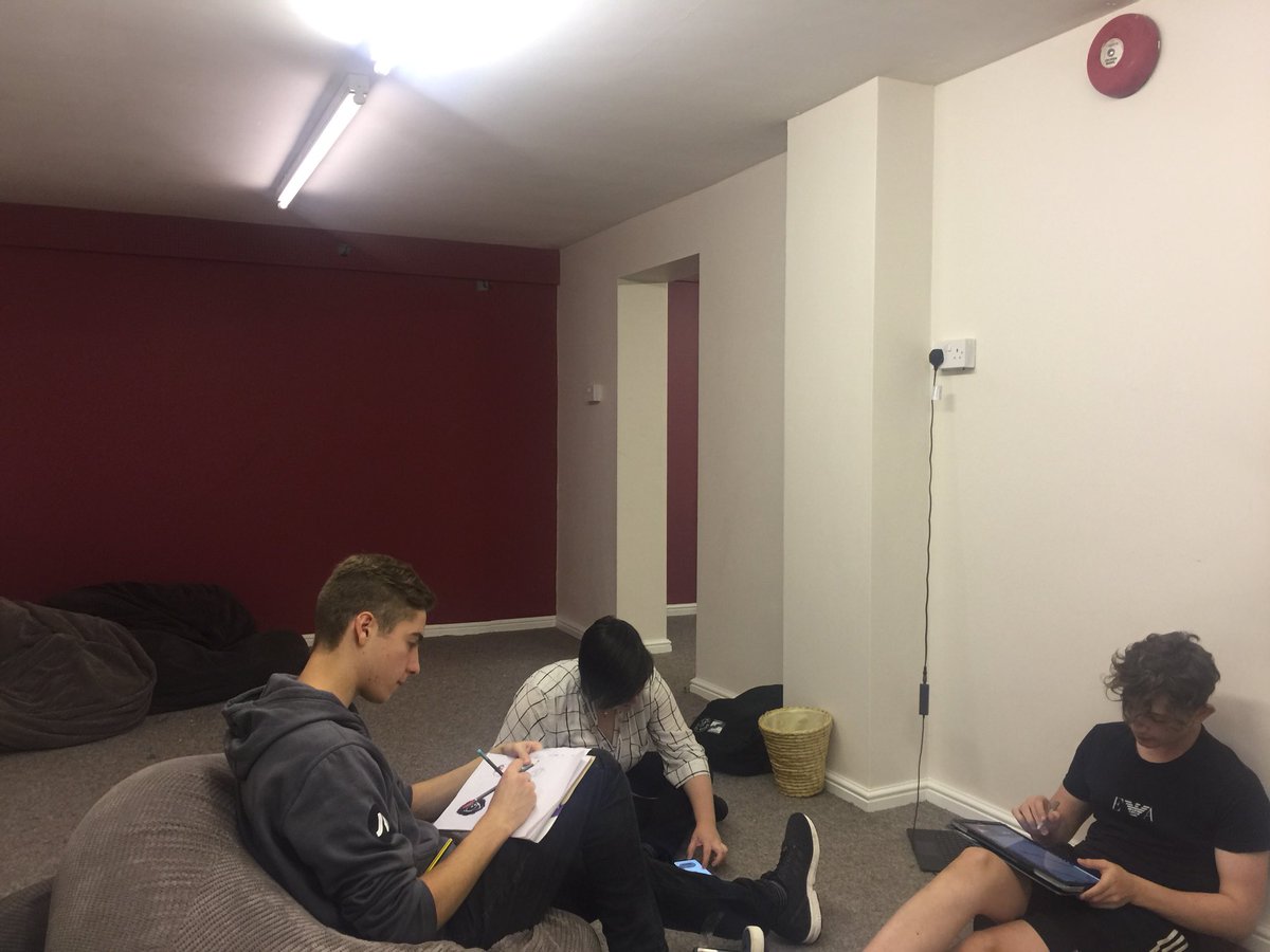 The art team working hard designing leaflets and posters to raise awareness about male domestic abuse!