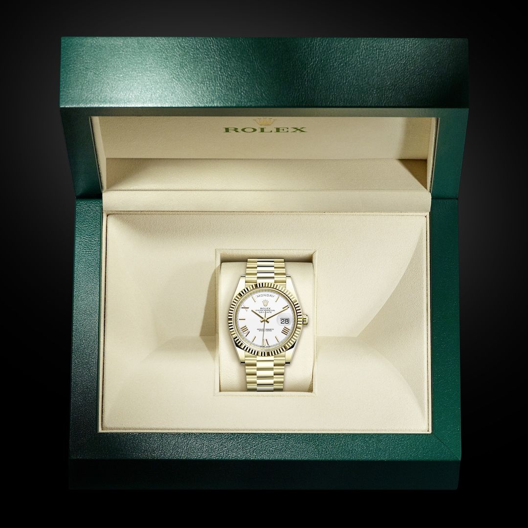 The Rolex Day-Date 40 in 18 ct yellow gold, 40 mm case, White dial, President bracelet. The presidents' watch. #Rolex #DayDate