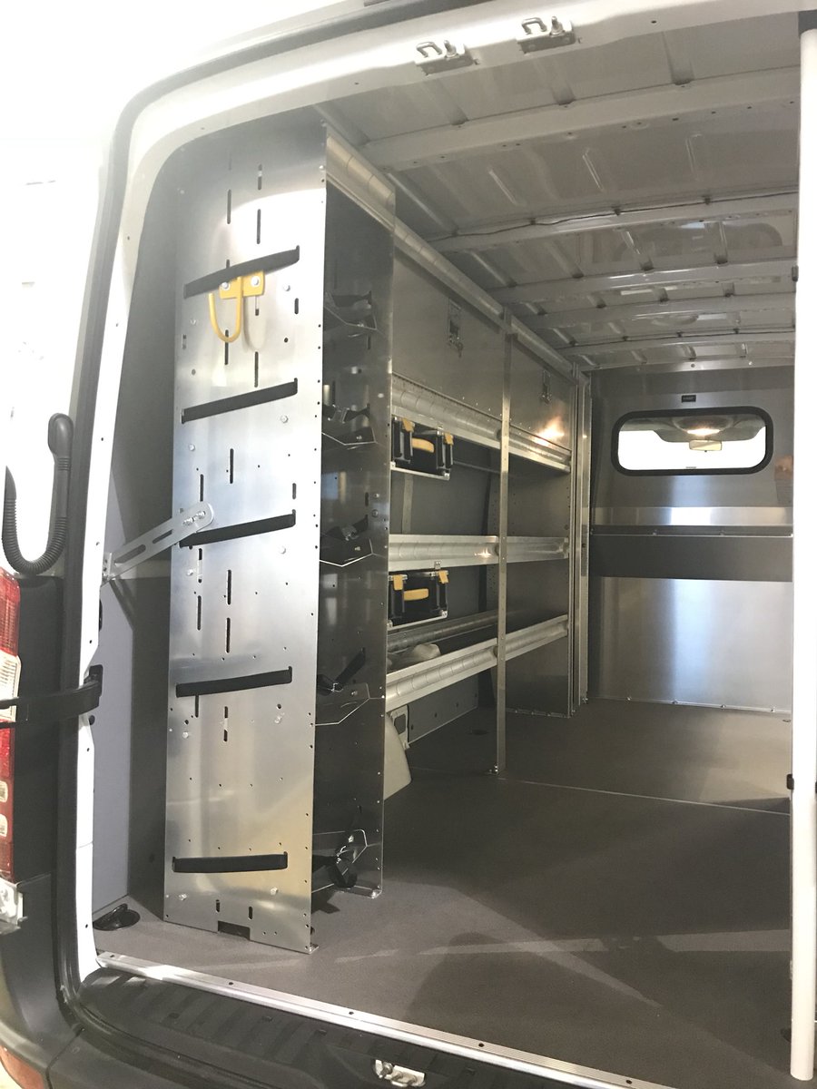 SuperiorCDesign's tweet photo. @RangerDesignInc ladder rack, partition, shelving with locking doors, locker, workbench, refrigerant towers, hook, partskeepers, and cab box (not shown) installed in a Mercedes Sprinter 144 standard roof cargo van. https://t.co/2Xeao0ICJV