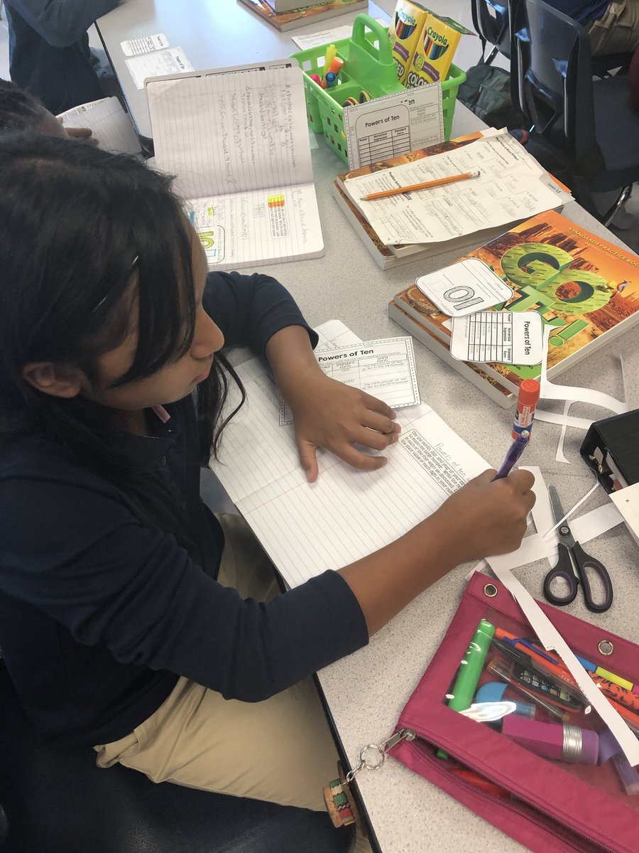 PBGHS_Principal's tweet image. Ms. Mulcahy’s 5th Grade Mathematicians are already working hard on the Powers of 10 🦁@ErinMulcahy6 #interactivenotebooks