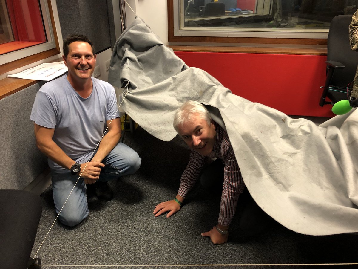 annakingradio's tweet photo. Who needs a tent anyway?! @DomCotter & @survivalcourses improvise basic camping in the studio. Aka #buildingaden 🏕 https://t.co/C29gs7kdqA