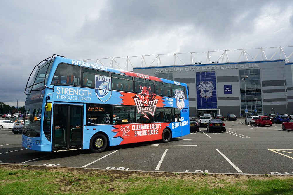 Cardiffbus's tweet photo. We are pleased to reveal bus 472 proudly wearing it's new livery, celebrating the sporting success of @GeraintThomas86 @CardiffCityFC @cardiff_blues & @cardiffdevils. Look out for it on the roads tomorrow, check here to see which routes it will be running on tomorrow. #cbupdate https://t.co/mwncxvq1lg