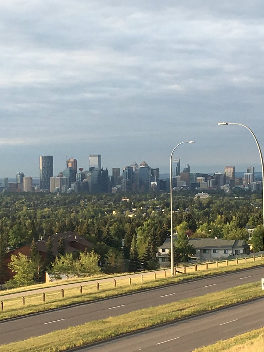 jones_clint's tweet photo. Too smokey from the forest fires in British Columbia to do anything outside in Calgary today. I took these pictures of downtown Calgary from the same spot, just 2 days apart. https://t.co/9D45vYz0Ew