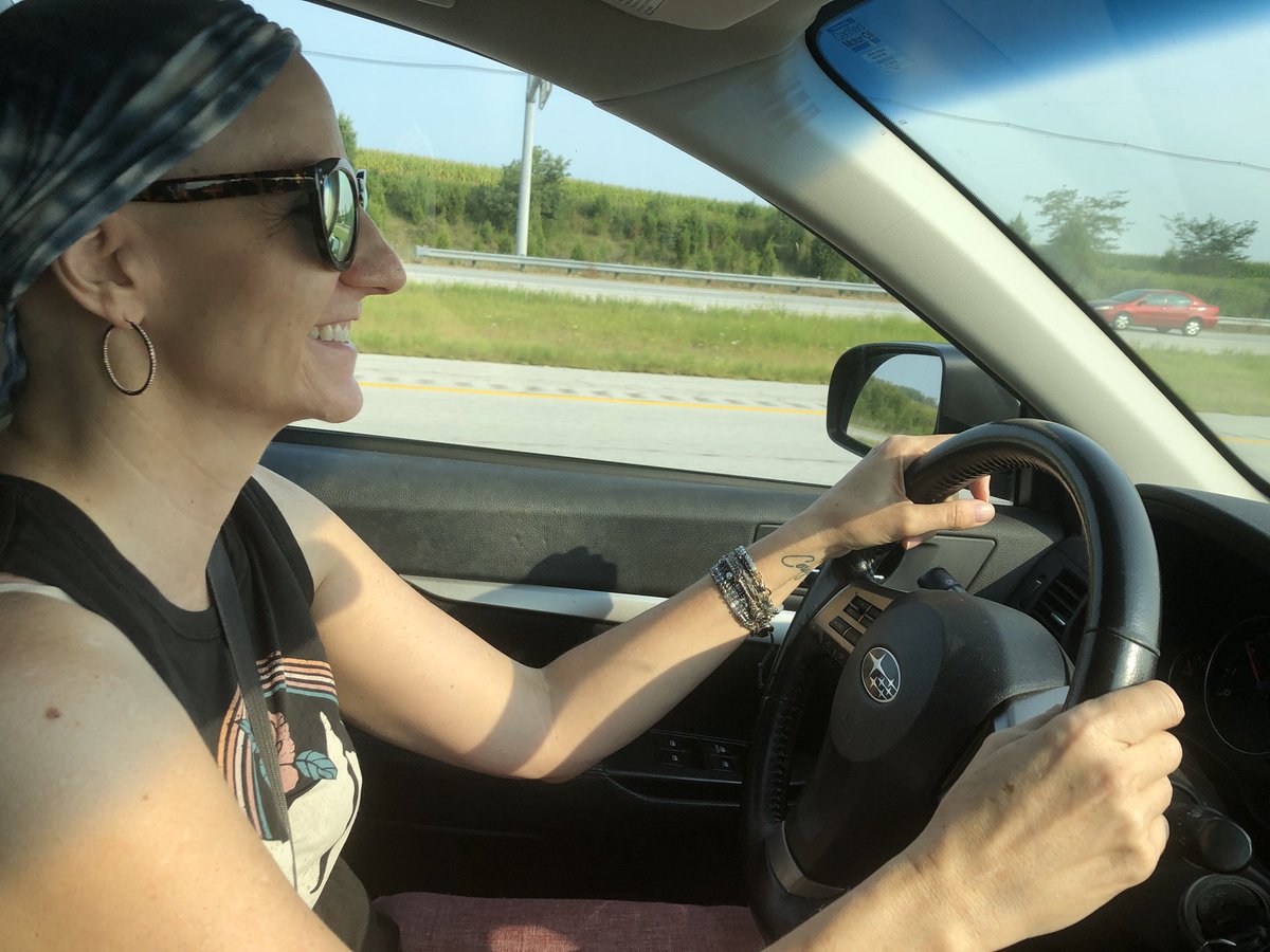32. Nancy driving to Columbus. She’s rocking that headscarf.