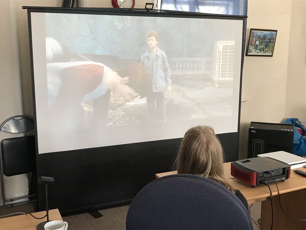 blindinbusiness's tweet photo. Sophie is sight impaired and is playing a PS4 game on a 100inch projector screen.  Minor adaptions can make mainstream gaming accessible to those with visual impairments #gaming - Join Gamesaid and vote for Blind in Business https://t.co/uOUqJXcfsr https://t.co/SheMKfWiT8