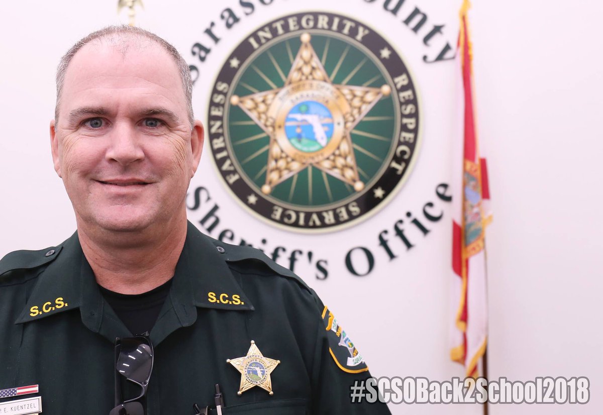 SarasotaSheriff's tweet photo. Everyone, meet Deputy Edward ‘Chip’ Kuentzel! He is a FAVORITE among students at Sarasota Middle School and has been serving with SCSO since 2004. Fun fact... he is an NFL nut and LOVES the @Ravens! #SCSOBack2School2018 #GetToKnowYourSRD #BestOfTheBest https://t.co/nPMmRHC5ol