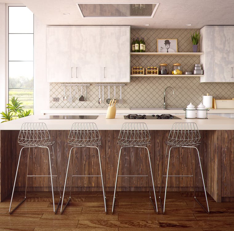 An updated take on a vintage design, metal bar stools bring a dash of industrial influence to your entertainment ensemble.
