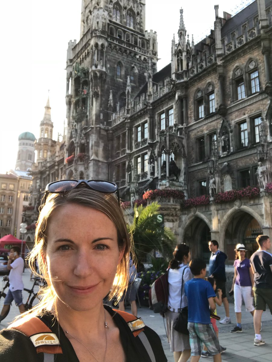 Our <a href="/JessCameron/">Jessica Cameron</a> poses for a selfie outside Munich Town Hall in Germany #CityHallSelfie #bangthetableteam