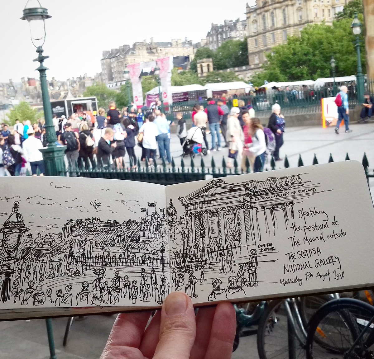 edinsketcher's tweet image. Sketching on the #Mound this afternoon in my landscape sketchpad, a great frame to capture a street scene. Gonna try and capture the colours of @edfringe before the rain starts!! #wishmeluck
#edinburghbloggers #Edinburghfestival #streetact #penandink #sketchpad #usk #happycrowd