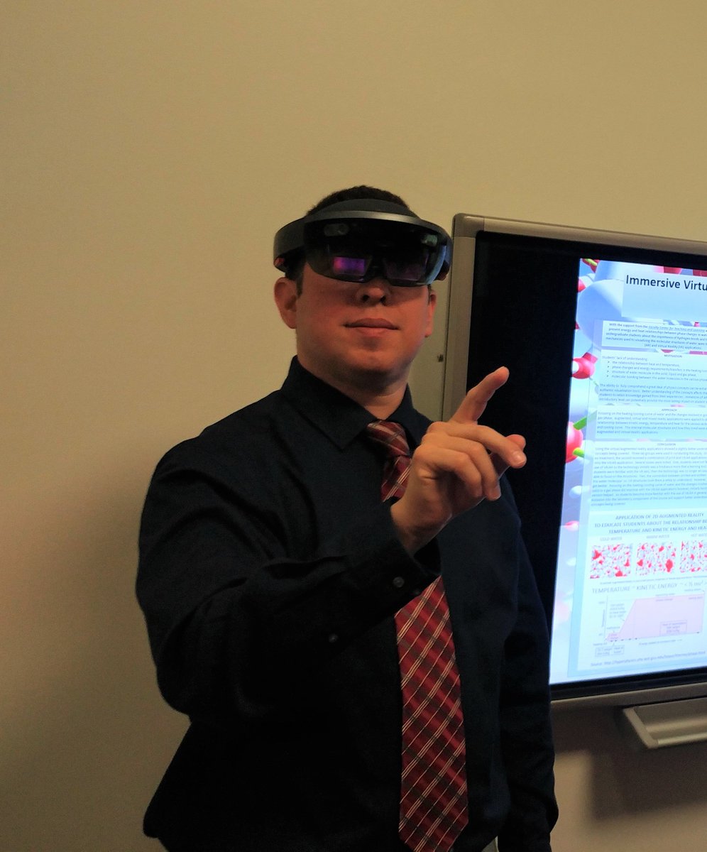 RidwanSakidja's tweet photo. Presenting Immersive Virtual/Mixed Reality Apps 4 Intro Physics Education at 33rd Showcase on Teaching & Learning #FCTLShowcase @FCTLMSU with Becky Baker @PAMSatMSU @CNASatMSU. Huge thanks to our student Chris Robledo & Jan Johnson @LibrariesMSU w/ the cool @HoloLens technology ! https://t.co/4cIFDmCKbD