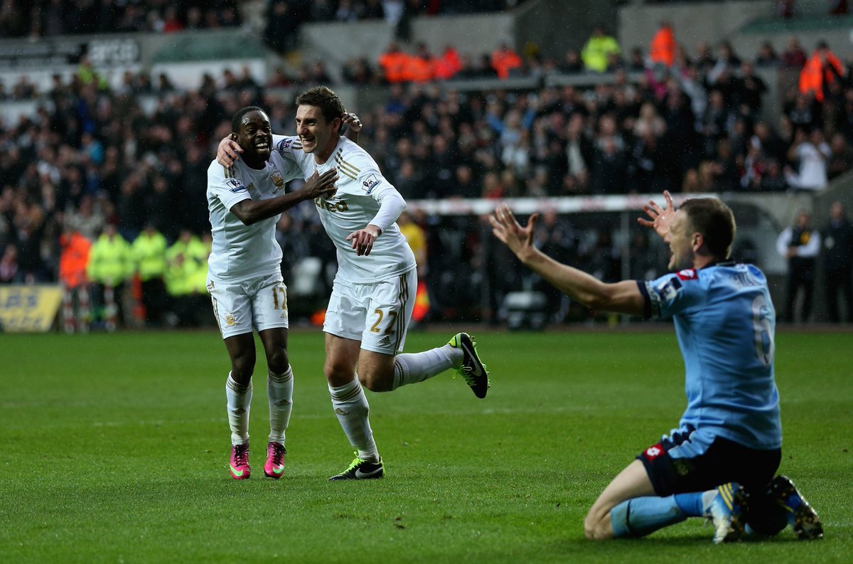 ReadSwansea's tweet photo. Good luck to Angel Rangel who has today signed for Championship outfit QPR. 

Picture: Rangel scores in a 4-1 win over QPR in February 2013! https://t.co/fvTPCxN5cT