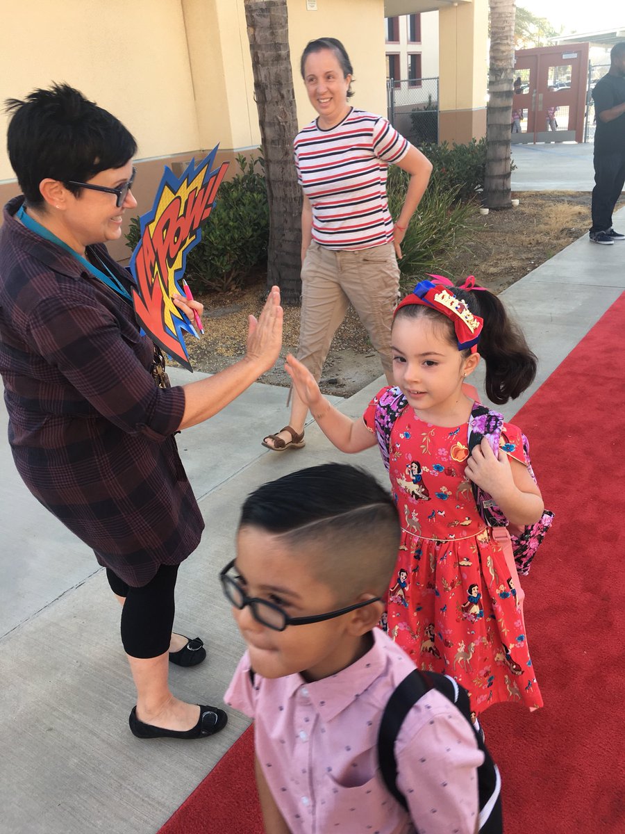 MayRanch's tweet photo. Teachers and staff greeting students with high fives, smiles, and encouraging words as they come for the first day of school! #vvusdfirstdayofschool18 #vvusdfirstday18 @ValVerdeUSD https://t.co/y0TkQqo4PL