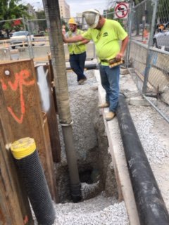 louisvillemsd's tweet photo. A 16-inch water main has been reconnected to a 30-inch main and is going back in as repairs continue at East Broadway at South Preston Street on a collapsed sewer. Please use caution when traveling in the area. #MSDatWork https://t.co/XOC5ExSR6J
