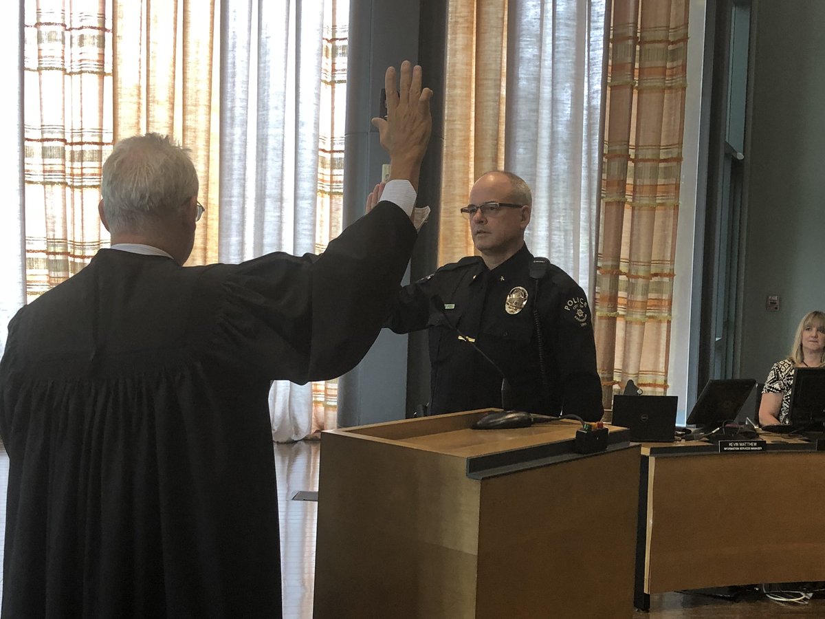 BremertonPD's tweet photo. Chief of Police James Burchett takes the oath of office tonight at the city council meeting.  We are blessed to have him as our Chief! https://t.co/ZMRQ8Uk3xH