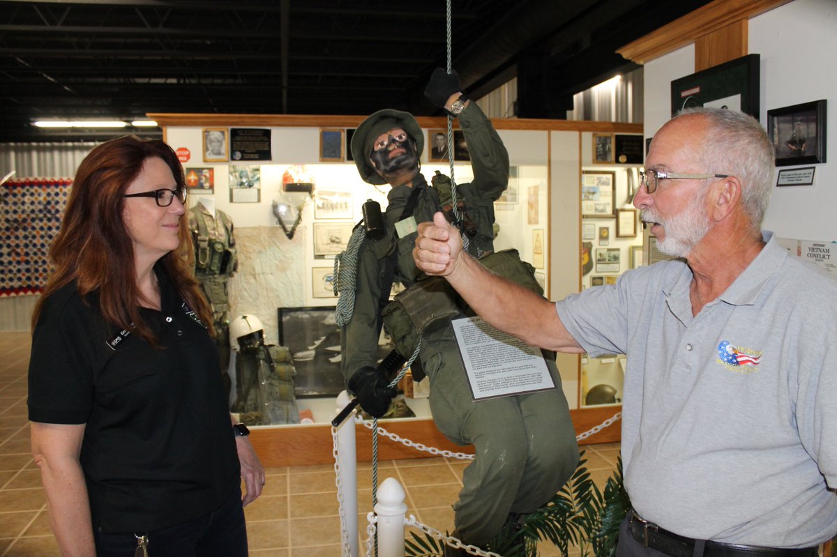 Legacy_WA's tweet photo. Vietnam Veteran, Bryon Loucks, explains to @secstatewa Wyman how soldiers repelled out of helicopters in the jungles. Thank you to the Veterans Memorial Museum in Chehalis for a fascinating tour. Read Loucks story: https://t.co/b2zuVVwgz0
#WaState1968 #Vietnam #veterans https://t.co/yx4U2uMo3d