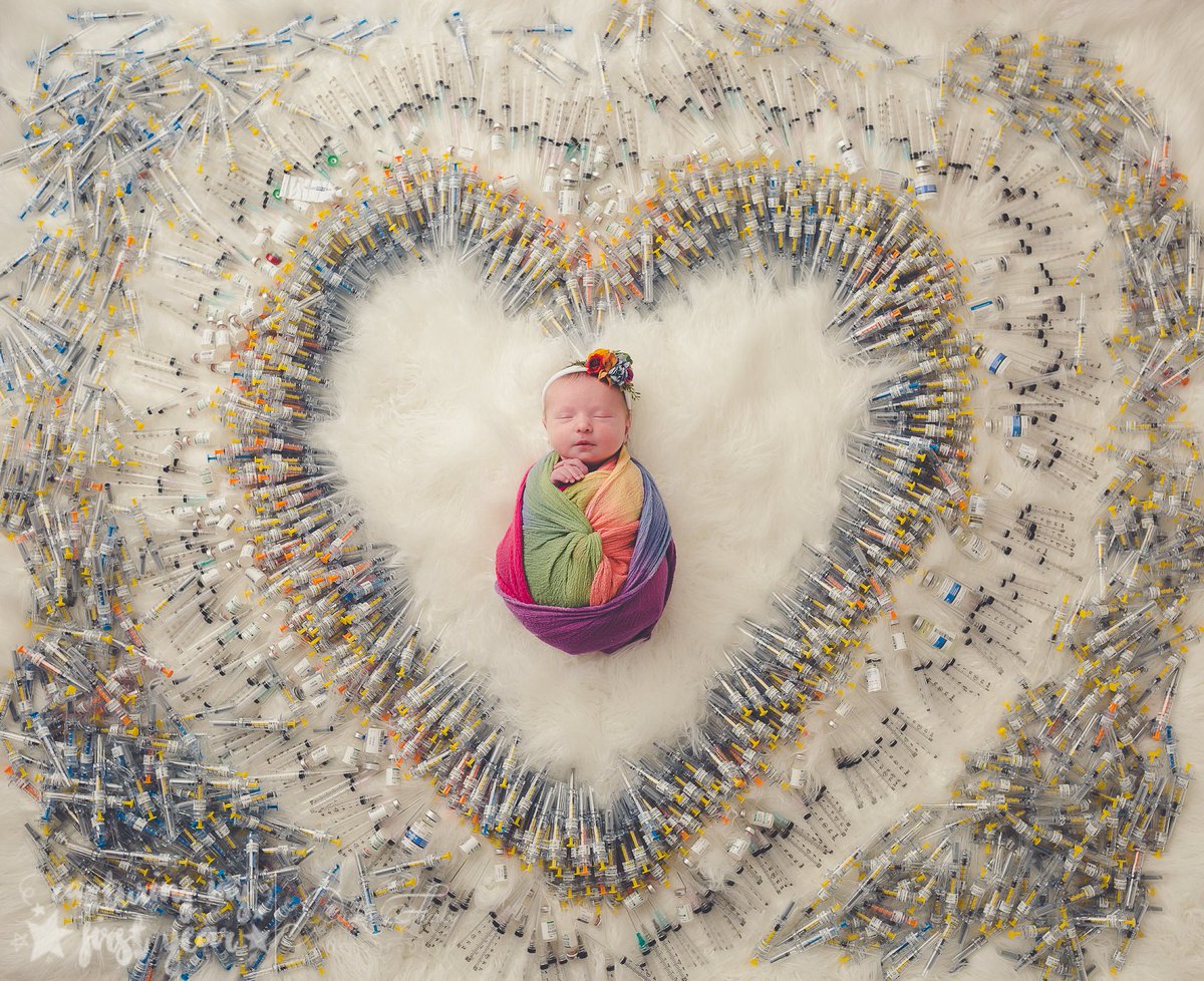 "4 years, 7 attempts, 3 miscarriages and 1,616 shots." 
A photo of a baby surrounded by IVF needles has gone viral.
Courtesy: Packer Family Photography   bit.ly/2ODKA1Y