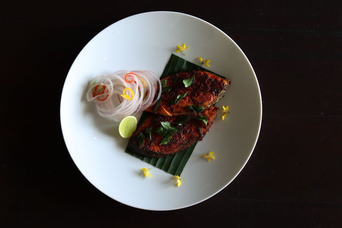 Fame_PH_Goa's tweet photo. The famous Meen Varuval is a shallow fry fish marinated with hot Indian spices. 🌶️
#ChettinadCuisine #PlanetHollywoodGoa #BeachResort #Fish #MeenVaruval #IndianSpices #CuratedMenu #SouthIndian #Fame #FameFood #FameRestaurant https://t.co/UXJUAaVBNI