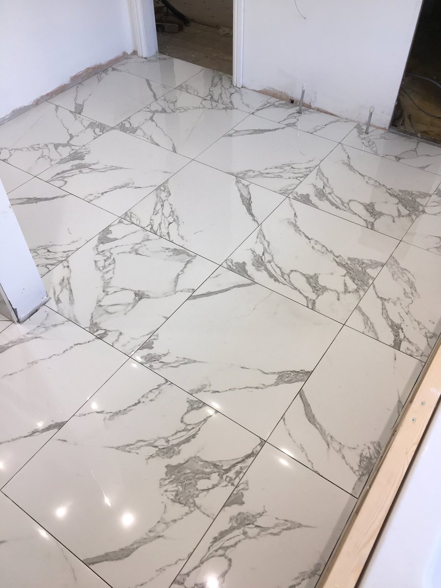 60x60 porcelain marble effect wet room shower area with mosaic ceiling. Tiles from <a href="/ToppsTilesTrade/">Topps Tiles Trade</a>. Raychem underfloor heating, <a href="/SGWeberUK/">Weber UK & Ireland</a> adhesive and <a href="/BALtiling/">BAL Tiling</a> micromax grout all from @CTDTrad in Hull
