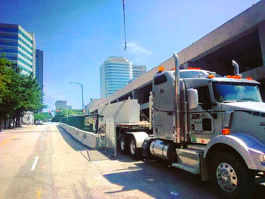 Company Driver, Chris Quinn, was enjoying the blue skies while he was being unloaded in downtown Richmond. #flatbed #trucking