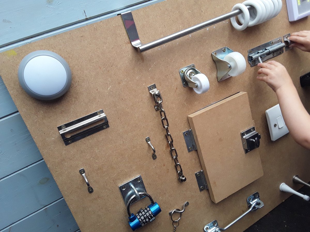 springnortheath's tweet image. Baby Room are enjoying their new fidget board, they&apos;re enjoying figuring out the interesting locks and switches