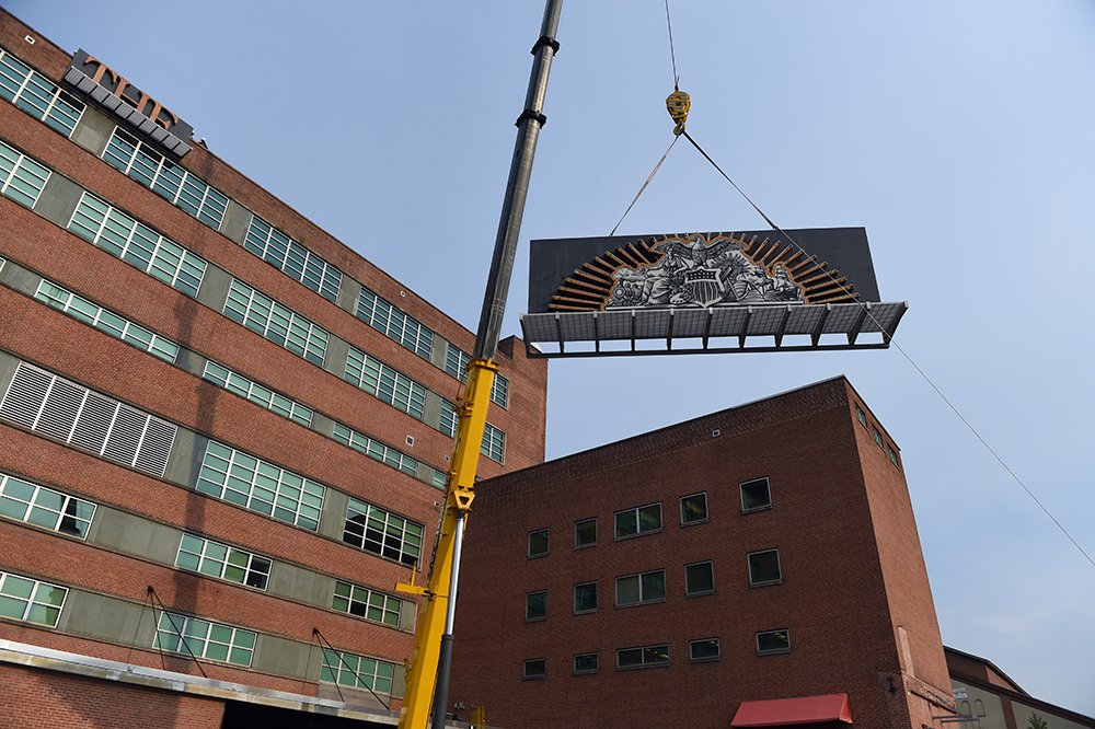 emmakatepatti's tweet photo. The @baltimoresun sign was removed off the former newspaper's headquarters on Calvert Street this morning. https://t.co/fyGH01WeQn https://t.co/jeudUqZv0o