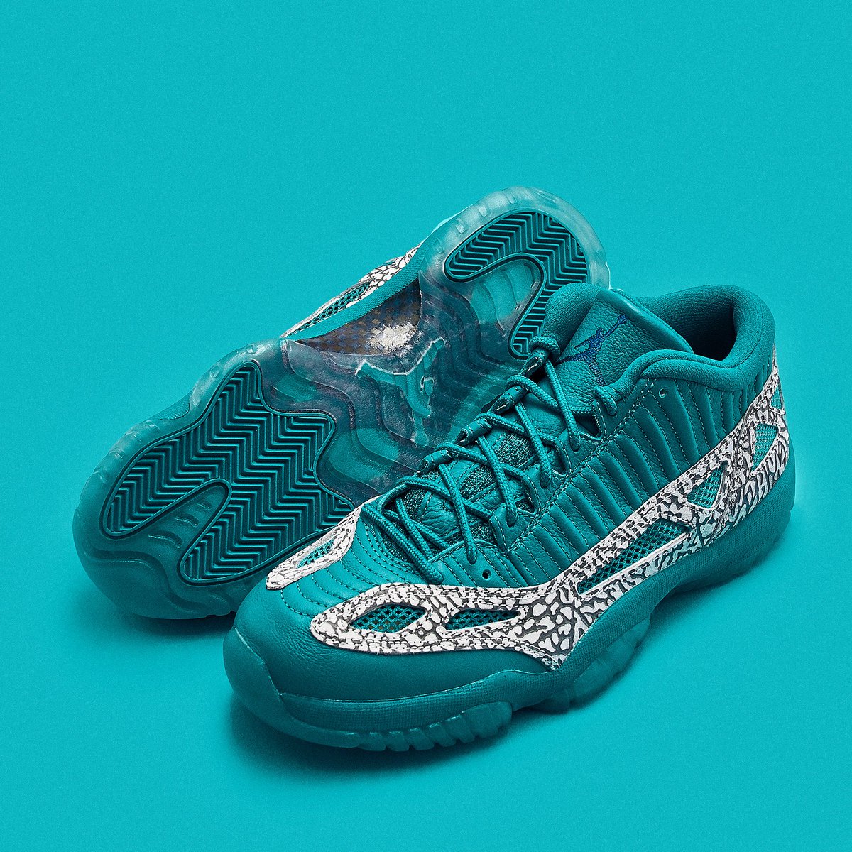 teal jordan 11 low