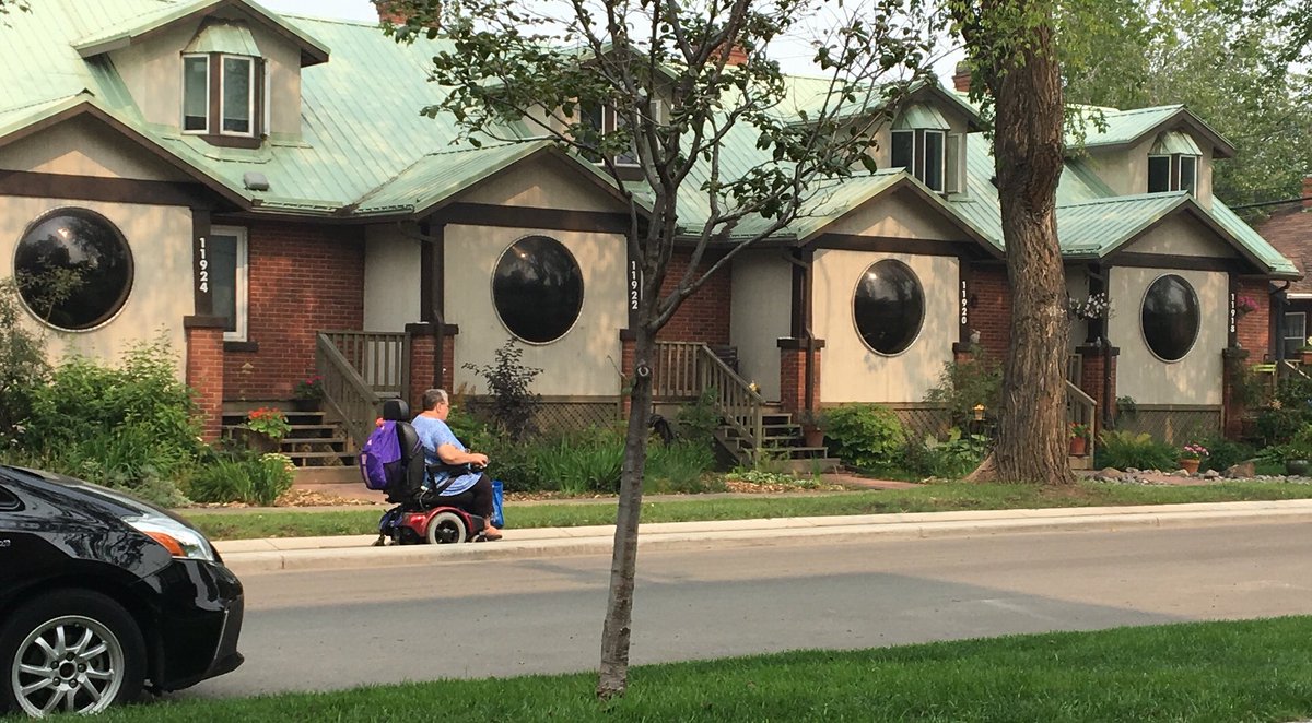 fatTireBikeBoy's tweet image. I’ve noticed many scooter users on the protected bike lanes (the Oliverbahn in this picture) instead of using the sidewalk. We need to ask why this is their choice, because it tells me there is a design fail in our sidewalks. #YEGbike #YEGwalk