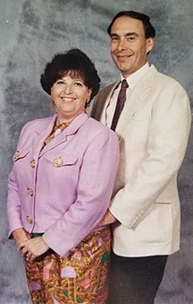 AuctionEngine's tweet image. Throw Back Thursday time! This is our owner, Keith, and his wife, Val, posing prom style in what has got to be the late 80's, early 90's. Show us your throw back pics! #TBT