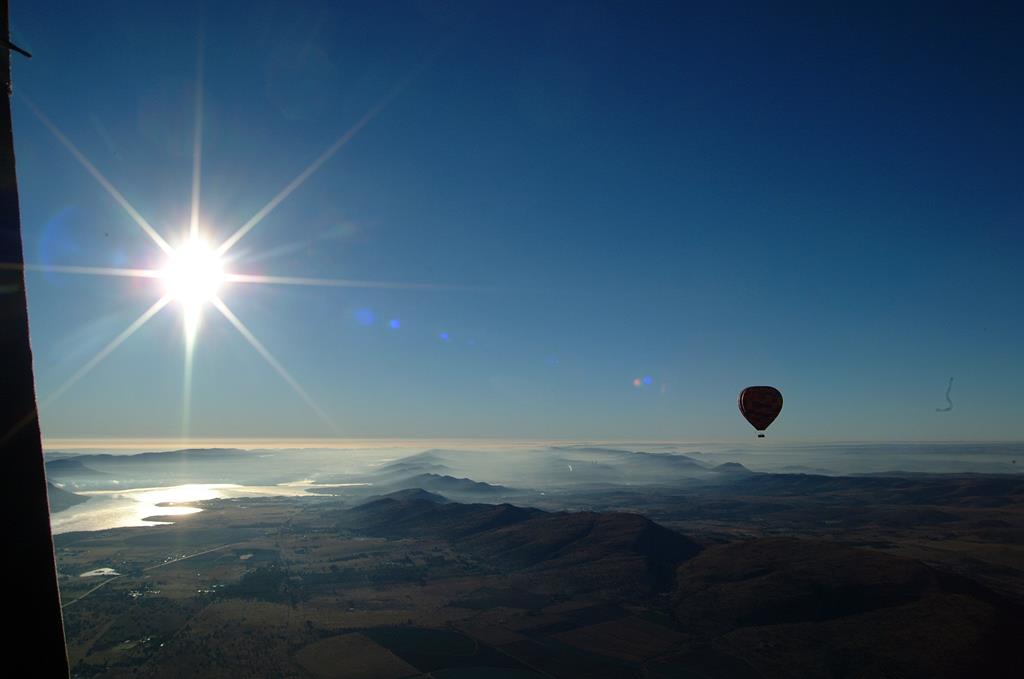 Harrops_Balloon's tweet photo. There is no greater joy than to have an endlessly changing horizon, for each day to have a new and different sun. - Christopher Mc Candless Come and fly with @Harrops_Balloon #bhobs #ballooning #southafrica https://t.co/L8jRkxfV8V