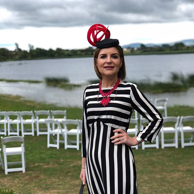 MargaretMolloy's tweet photo. Lovely time at Christina and Daniel’s wedding in Tipperary. #wearingirish DRESS @marion_murphy_cooney HAT @siobhandalydesigns NECKLACE @bealeyvonne RING @inner.island EARRINGS @liwujewellery BAG @holdenleathergoods https://t.co/VJYjprrL4s https://t.co/dq62QQGVvN
