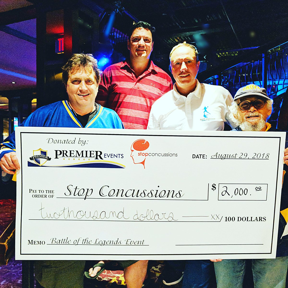 PREM1ER_EVENTS's tweet photo. We are proud to support @stopconcussions which is designed to educate the effects of concussion injuries.Yvon Barrett (aka Denis Lemieux from the movie Slapshot) is also an advocate, and grateful to accept our donation on their behalf. #localcharity #stopconcussions #playsafe https://t.co/EsUr56yCQh