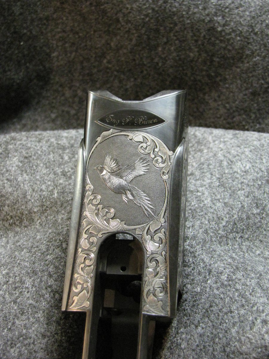 FirearmEngraver's tweet photo. Nothing like a beautiful pheasant. This one was featured in Tom Turpin's book: Modern Custom Guns: Walnut, Steel, and Uncommon Artistry #pheasant #Biesen #hunting #art #craftsmanship #engraving #scroll #Firearms #NRA https://t.co/umEkW68lik