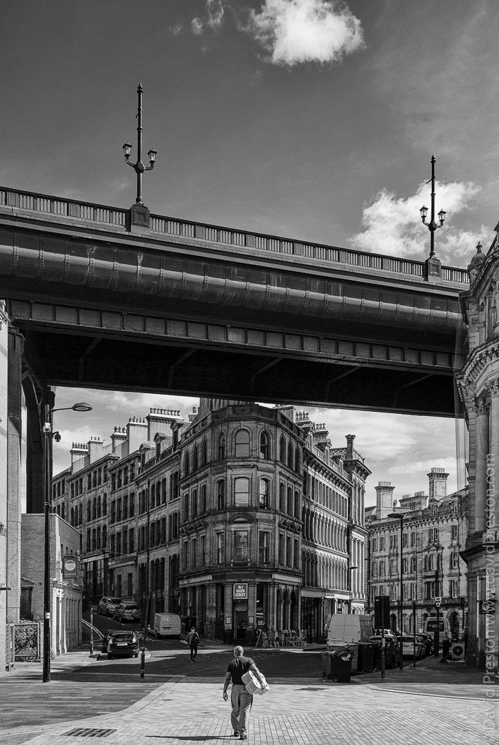 PrestonDn's tweet photo. I love the random opportunities that cities present. Man with paper towels. #Newcastle #getnorth2018 #streetphotography https://t.co/JTgIdBfL9l