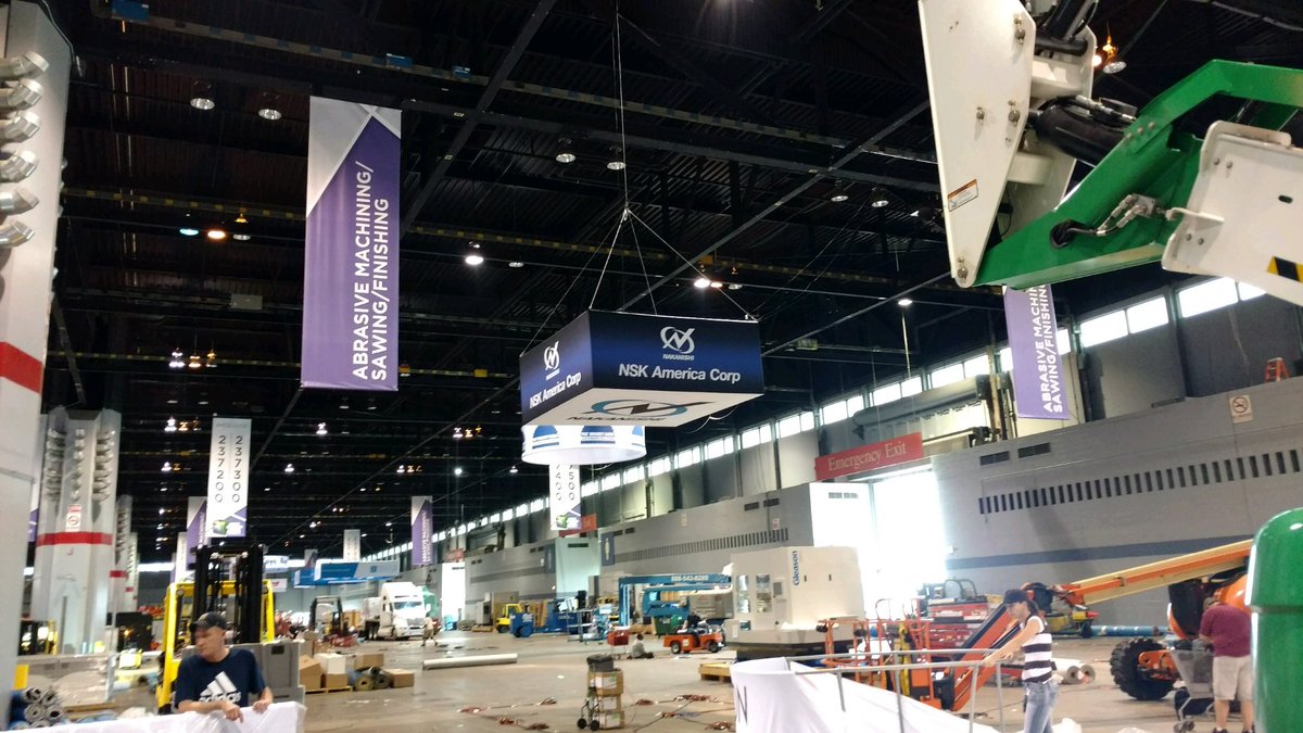 NSKAmericaCorp's tweet photo. The overhead is up! We're chomping at the bit to get our #IMTS2018 started! We hope to see you all in the North Building, Booth 237311 September 10 - 15!!! #SpeedMatters #Productivity #MicroMachining https://t.co/4YYPuPJMiM