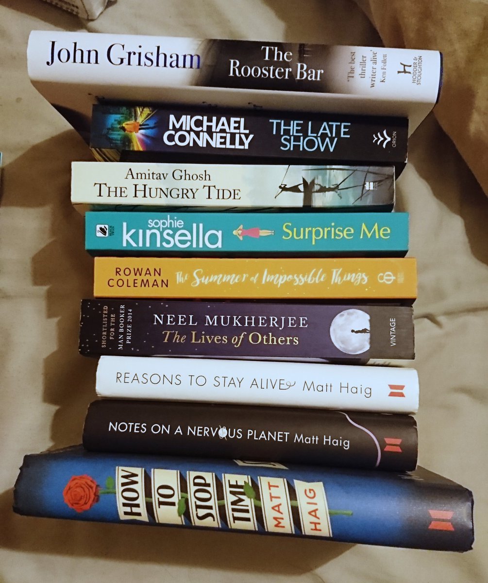 Stack of books I'm taking on holiday with me. ...including some favourites to re-read. Too many or too little? @JohnGrisham @Connellybooks @GhoshAmitav @kinsellasophie @rowancoleman #NeelMukherjee @matthaig1