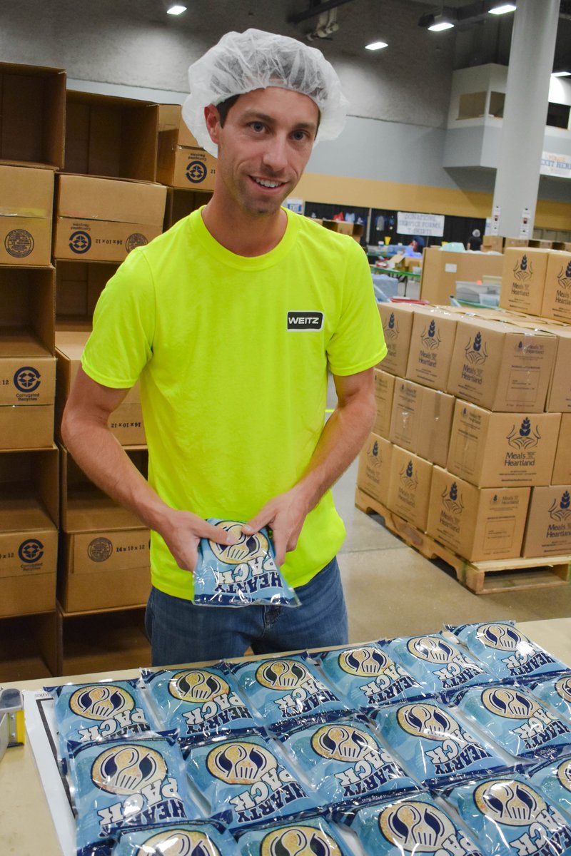 TheWeitzCompany's tweet photo. Yesterday a group from our Weitz Iowa office spent the afternoon packing meals with the wonderful team at @MftH! In the past 10 years this organization has provided over 100 million meals to the hungry in Iowa and around the world, and we're proud to help. #WeitzCares https://t.co/YO15yqQTDC