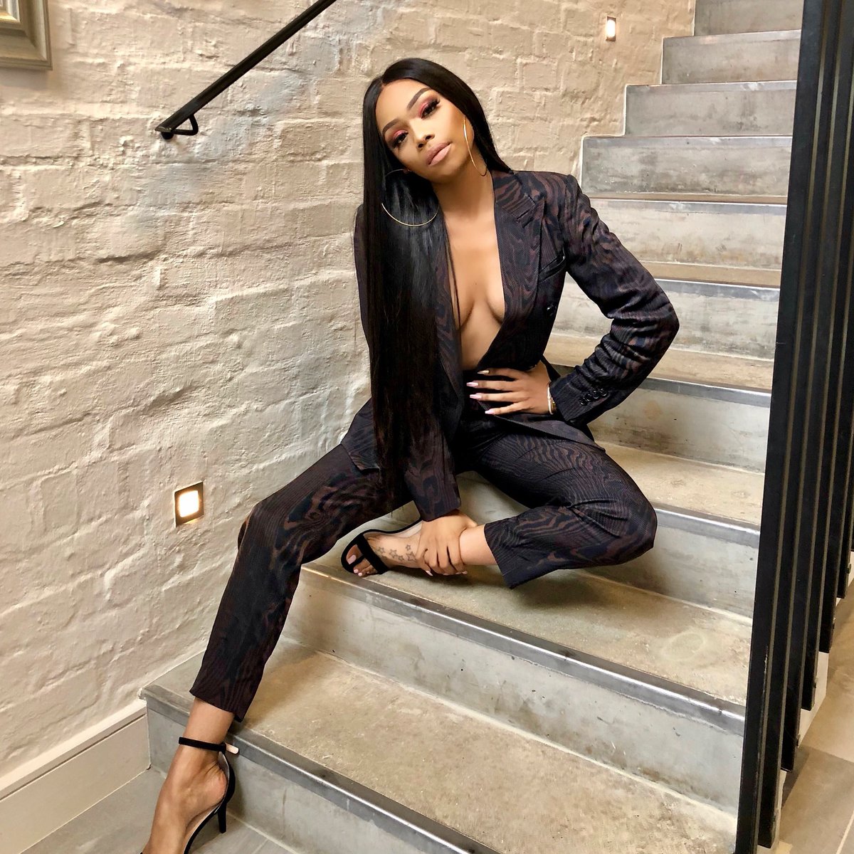 Bonang's tweet photo. ....that super sexy morning I spent with GQ SA... 🔥❤️ #TBT #PowerIssue https://t.co/GfDWGGU76e