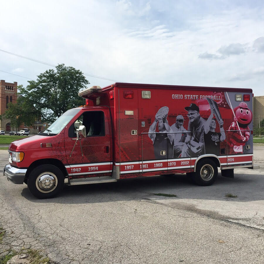 jupmode's tweet photo. Who’s ready for college football season?! Check out this #vinylwrap we did for a tailgate ambulance with #VarsityPride! Need a #vehiclewrap? Email us at info@jupmode.com! https://t.co/1pNqQ0Y3uD