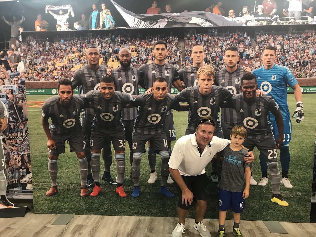 TommieMSoccer's tweet photo. Coach Lowery taking in the fair with his family and visiting the @MNUFC booth where former player @YonnorCoung was working #corndogsup @mnstatefair https://t.co/CrsvUOrMxZ