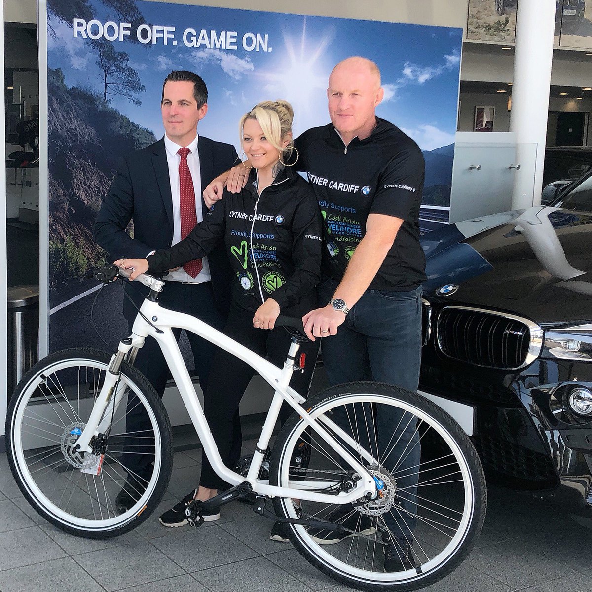 PollyJames's tweet photo. One week before I pack my bags and cycle from San Fran to LA! Ahhhhh! @Velindre @martynewilliams 😬 BIG thanks to @SytnerBMW in Cardiff for the posh bike threads &amp; @QDLContractors for hooking me up with a bike for training! I can’t thank you enough! Lots of love... 😘😘😘 https://t.co/RPKJ6C9GgB