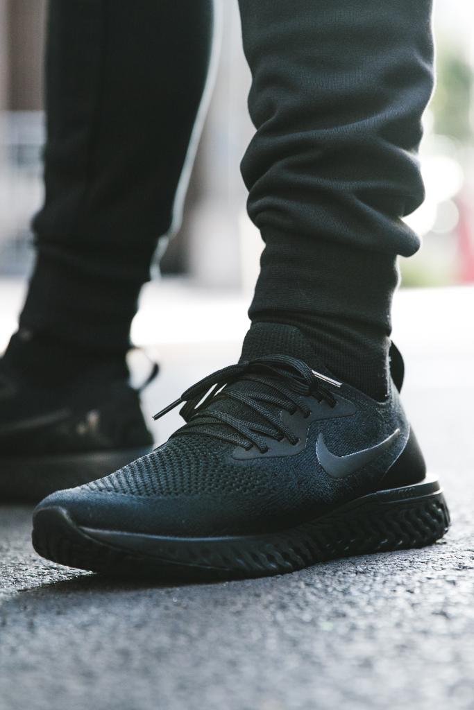 nike epic react flyknit black on feet