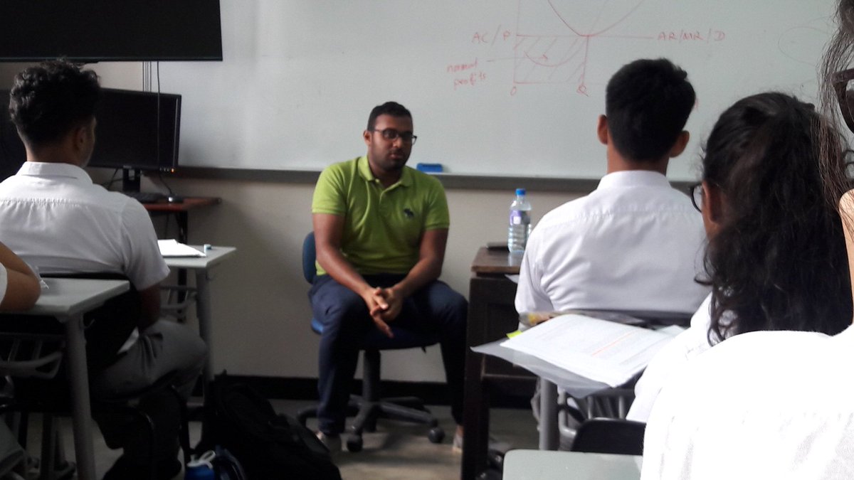 BSC_SSCommerce's tweet photo. Charith Abeyrathne, an old boy from BSC's 2014 batch, sharing his valuable experiences with the Y13 Economists https://t.co/6AeHLs8h4V
