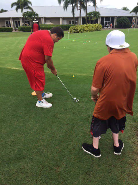 FTTreasureCoast's tweet photo. Athletes from Special Olympics working on their game at The Saints Golf Club. They love their new hats! #donationschangelives https://t.co/vnlUmyc2Gj