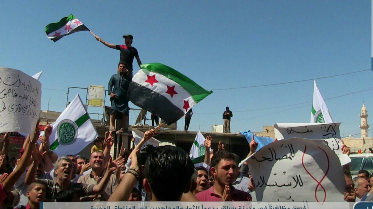 DrShajulIslam's tweet photo. unprecedented demonstrations in the liberated North of Syria.

Many flags of different rebels groups united to fight against the regime.

The focus was also against De Mistura, a UN representative, who is showing support for the regime against the people of #idlib. https://t.co/tUYNlFKZJf
