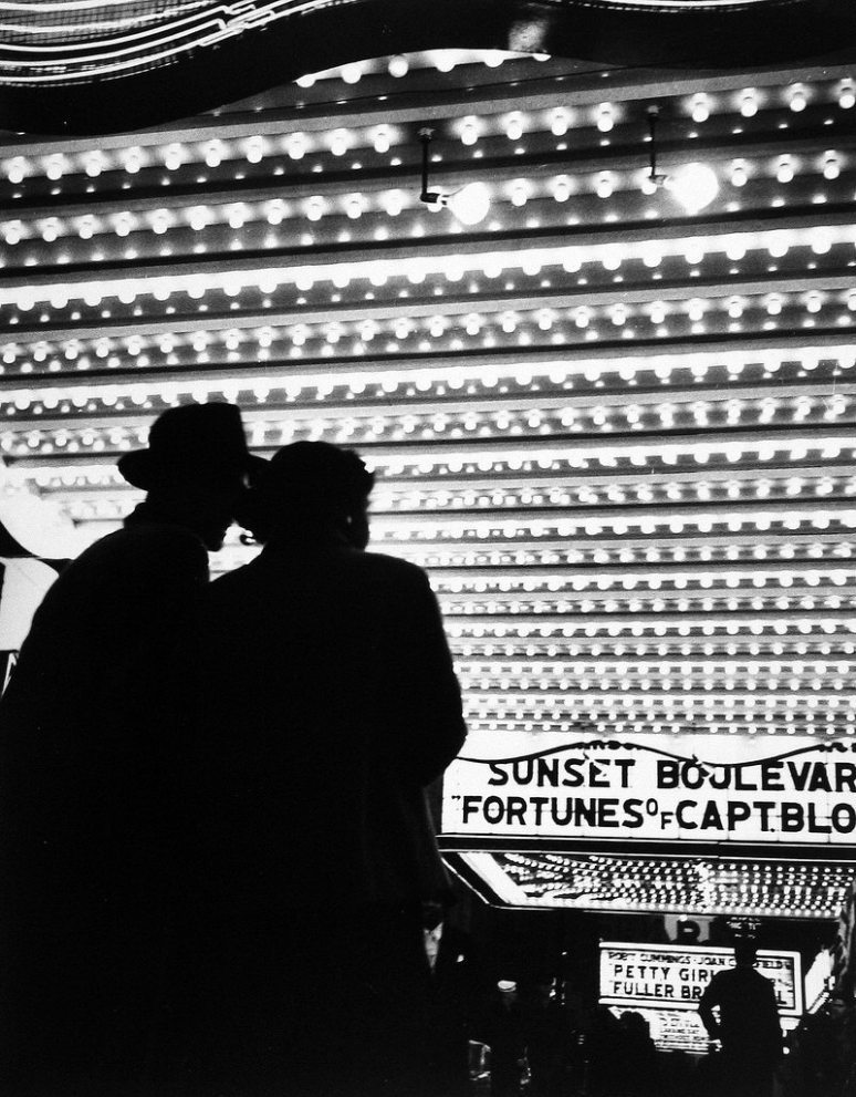 Times Square, 1950, Bedrich GrunzweigBlack Widow, 1954, Frank Oscar LarsonYoung Couple Hold Hands, Granada Cinema, London, 1957, Bert HardyDrive-in theater, San Fernando Valley, California, 1973, Steve Fitch