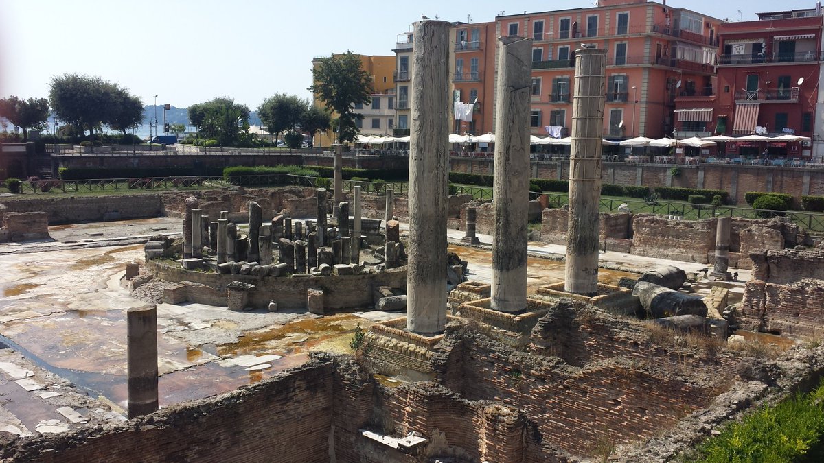heatherkhandley's tweet photo. In the footsteps of geologist Sir Charles Lyell today! #Lyell noted in 1828 that the 3 columns at the Temple of Serapis have dark bands from marine molluscs - so were submerged beneath the sea then uplifted on a short geological timescale #PrinciplesOfGeology #GeologyOnHoliday https://t.co/VwElUeOqoB
