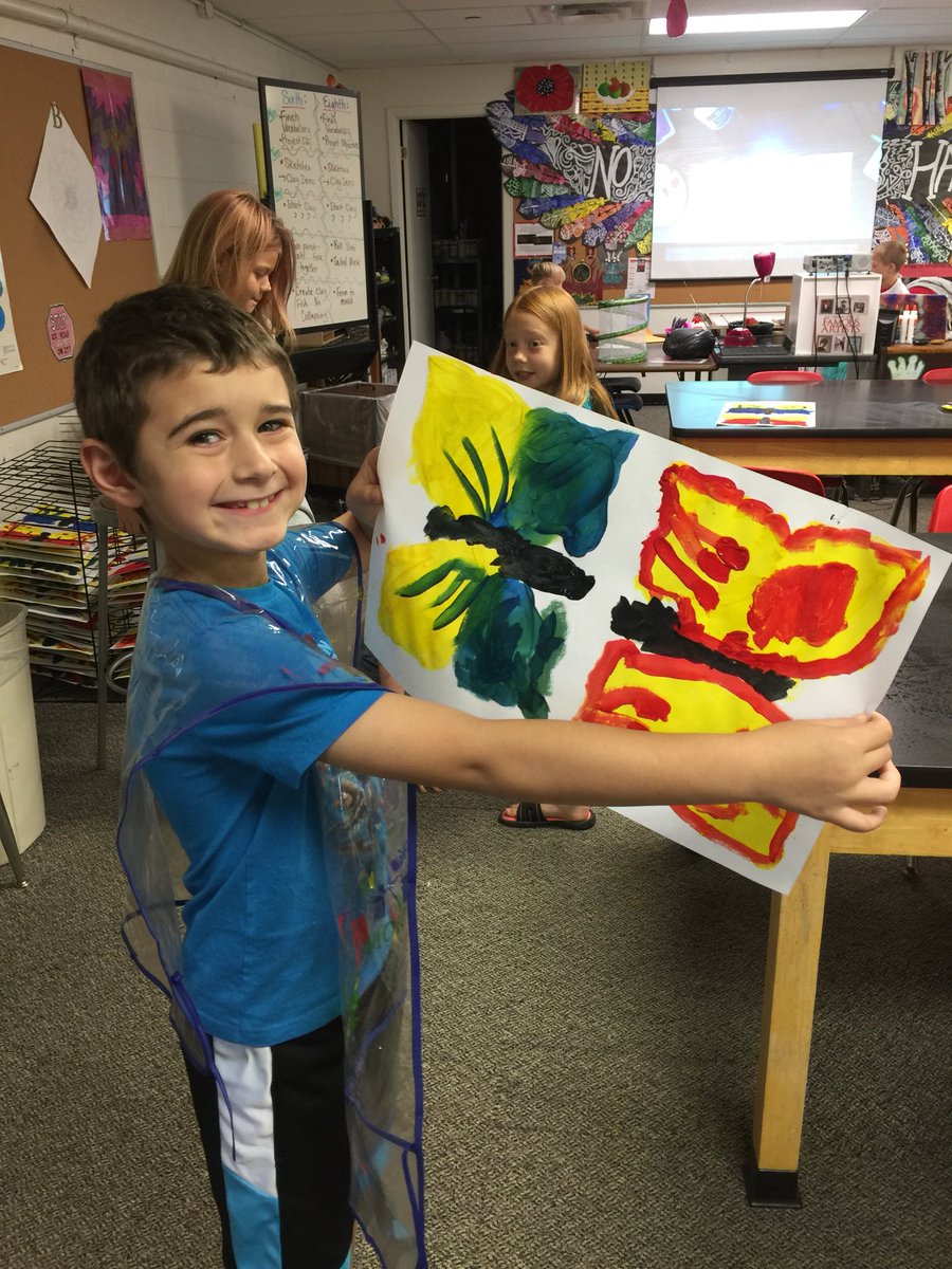This week second graders painted butterflies!!! Learning symmetry- if you paint it in one side, you must paint it on the other. Also blending primary colors on their paper to discover secondary colors!!