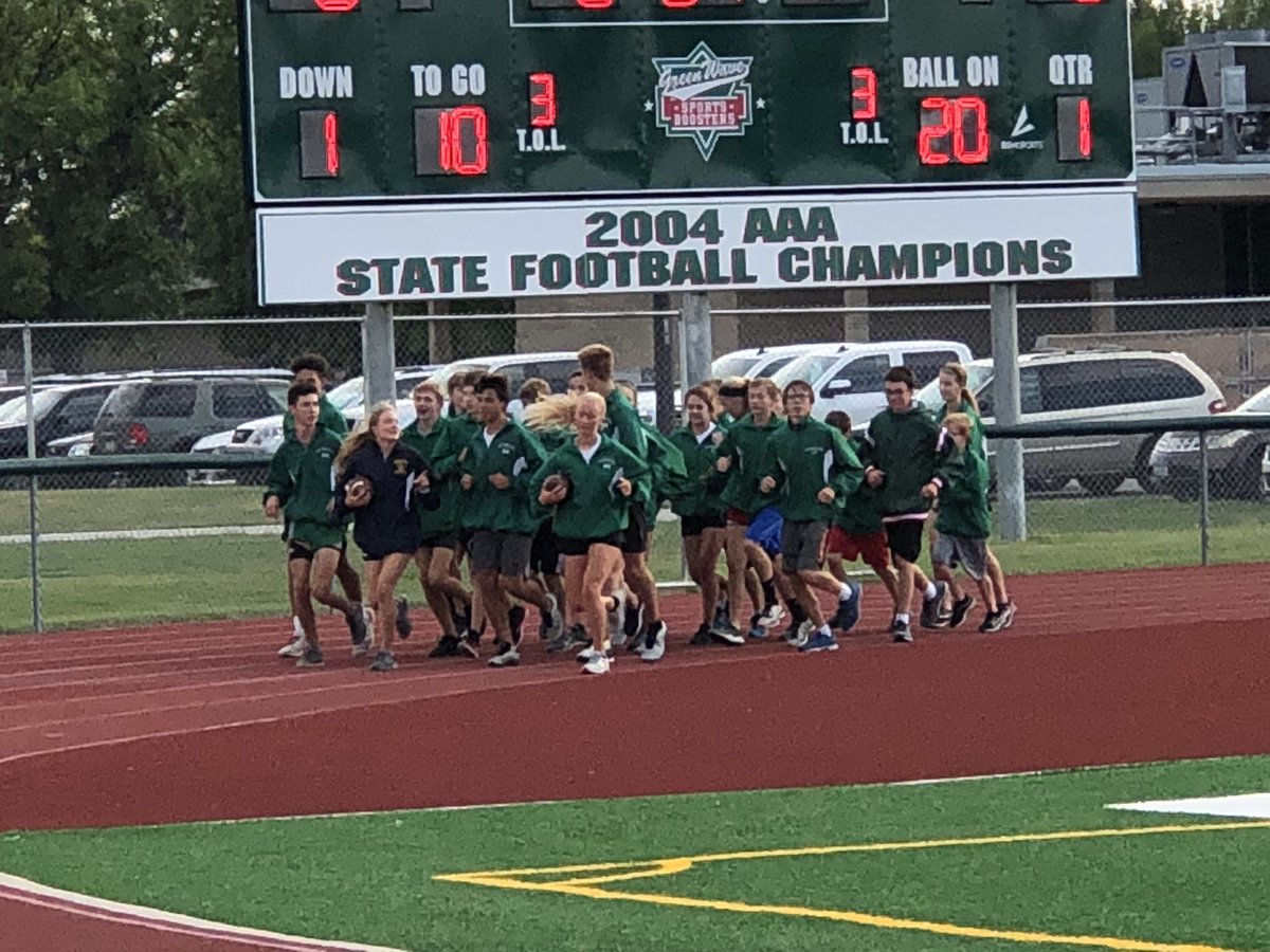 Great tradition! The CC runners from Crookston and EGF ran the game ball together all the way from Crookston! #EGFpride