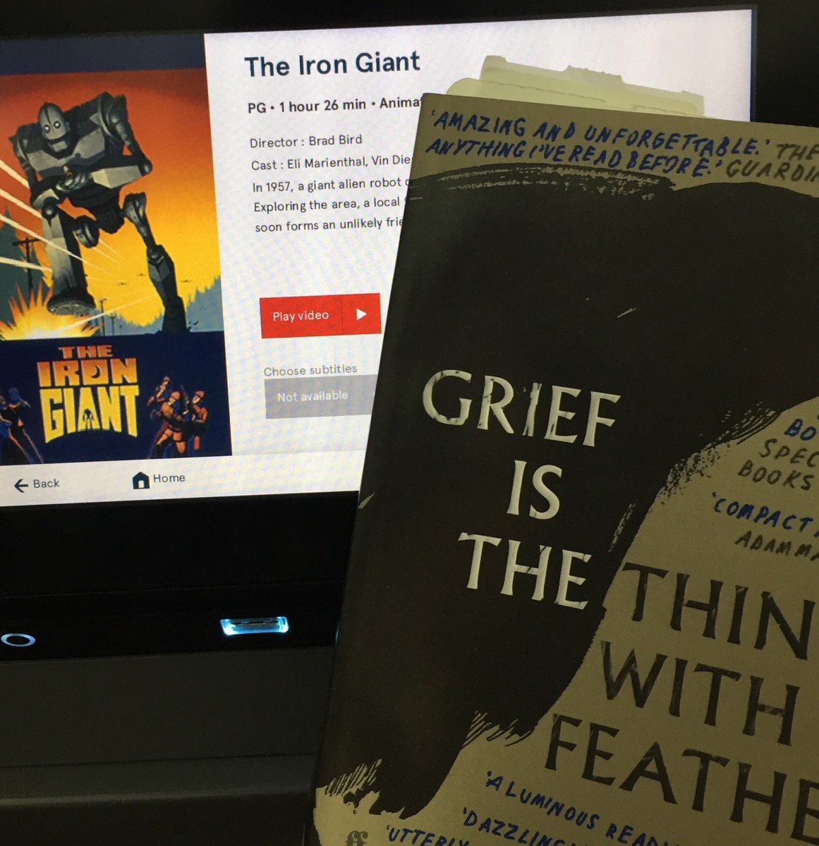 GaryLeising's tweet photo. In-flight entertainment returning home from @HughesCardiff — a Hughes-inspired book found at airport bookshop and one of the airline-provided movies. https://t.co/in6TXvZ8kV
